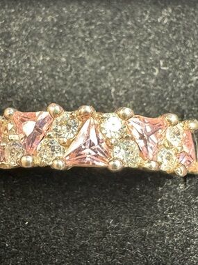 Gold Band Ring with Pink Triangle Stones and Clear Accents